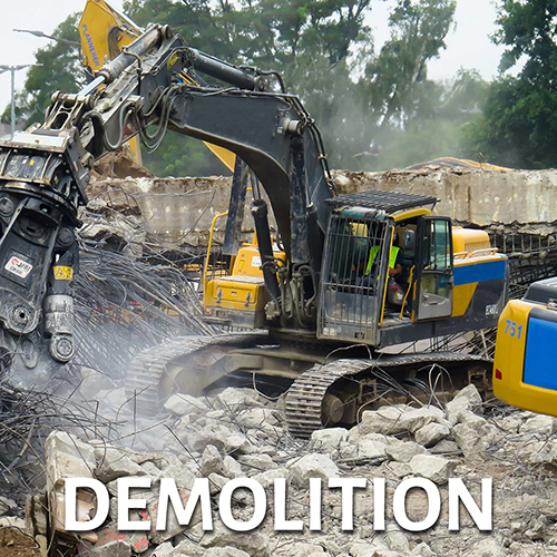 Excavator operator demolishing a structure - link